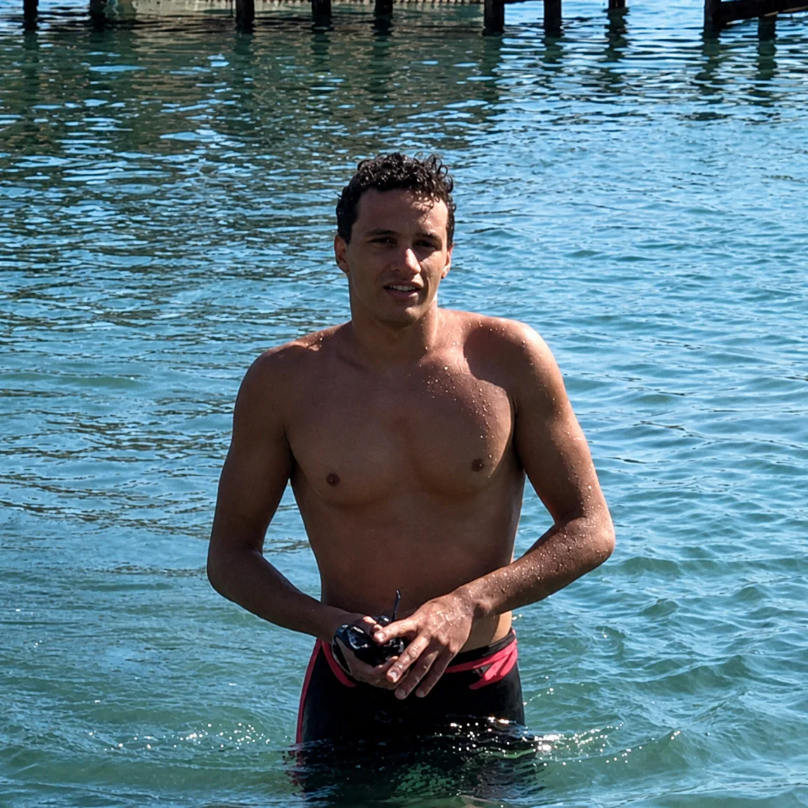 Amr Fathy standing in the water at the end of a lane